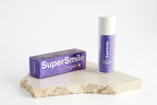 SuperSmile V34 Colour Correction Serum on a stone plinth